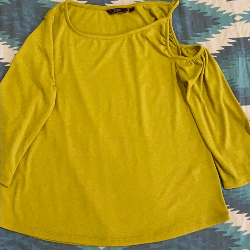 Trendy neon green top with a cold shoulder on left
